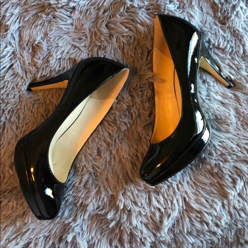 Black leather pumps